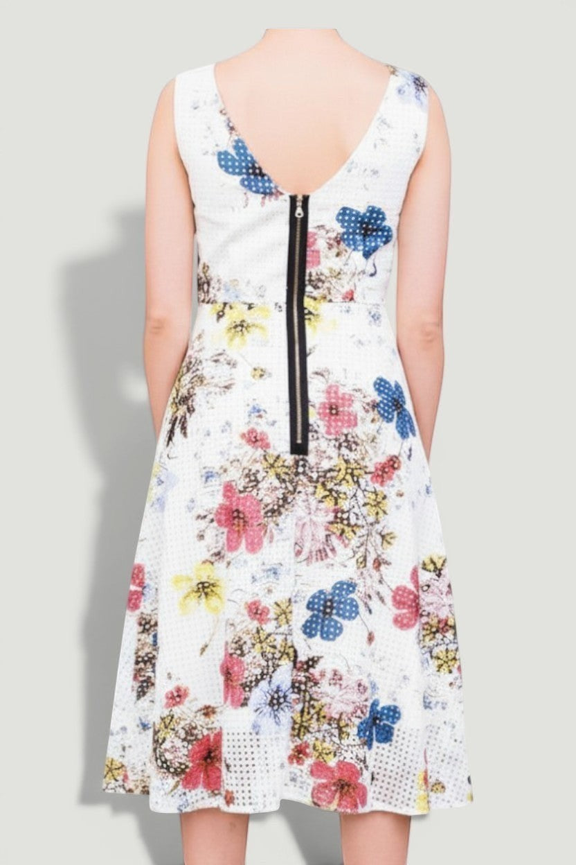 La Volta ERDEM sleeveless midi dress featuring a white floral print with a back zipper closure on a model