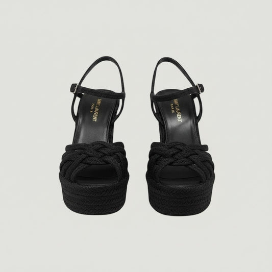 Saint Laurent black braided jute wedge espadrilles with ankle strap buckle closure, available at La Volta.