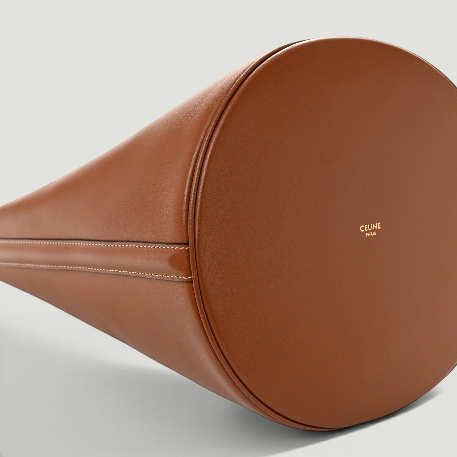 La Volta CELINE tan smooth calfskin Bucket 16 bag base with gold logo stamp and contrast stitching