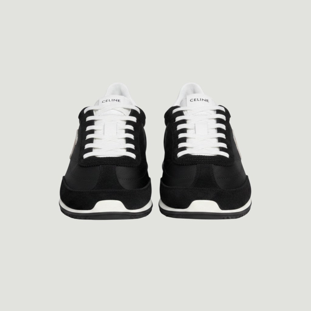 La Volta Celine Racer sneakers in black nylon and suede with white laces and tongue label, 70s athletic style.