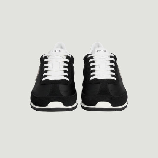 La Volta Celine Racer sneakers in black nylon and suede with white laces and tongue label, 70s athletic style.