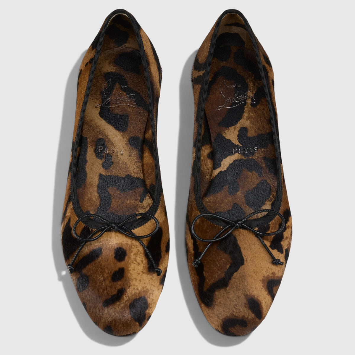 La Volta Christian Louboutin Sweetie Jane ballerina flats in leopard print pony hair with black bow detail
