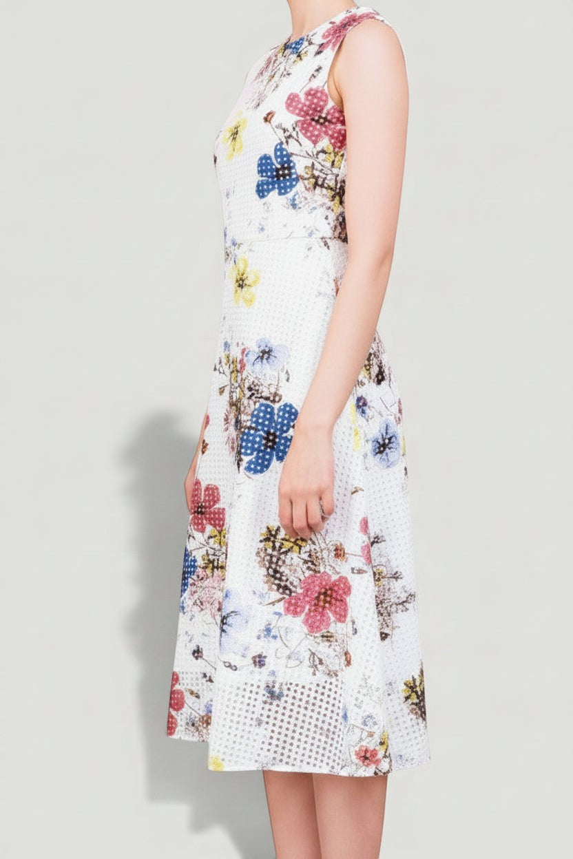 La Volta ERDEM sleeveless midi dress in white with a colorful floral print and textured eyelet fabric