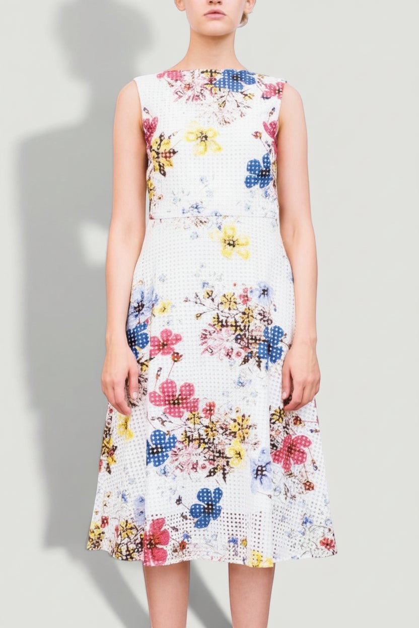 La Volta ERDEM sleeveless midi dress featuring a white base with vibrant floral patterns and a textured grid design.