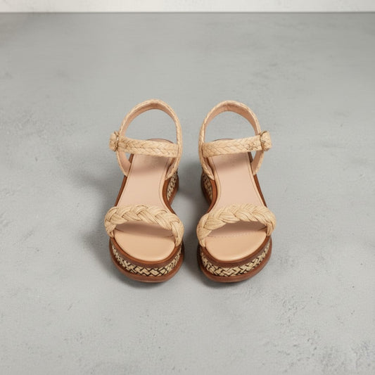 La Volta Gabriela Hearst braided raffia platform sandals with leather ankle buckle strap in beige.