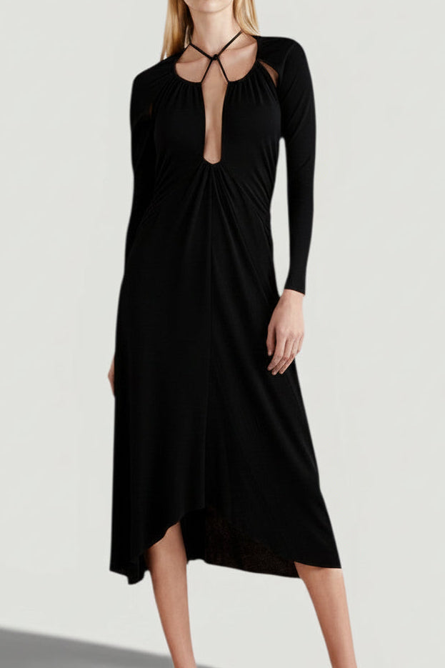 La Volta Isabel Marant black midi dress with halter neck, long sleeves, and cut-out detailing on a model