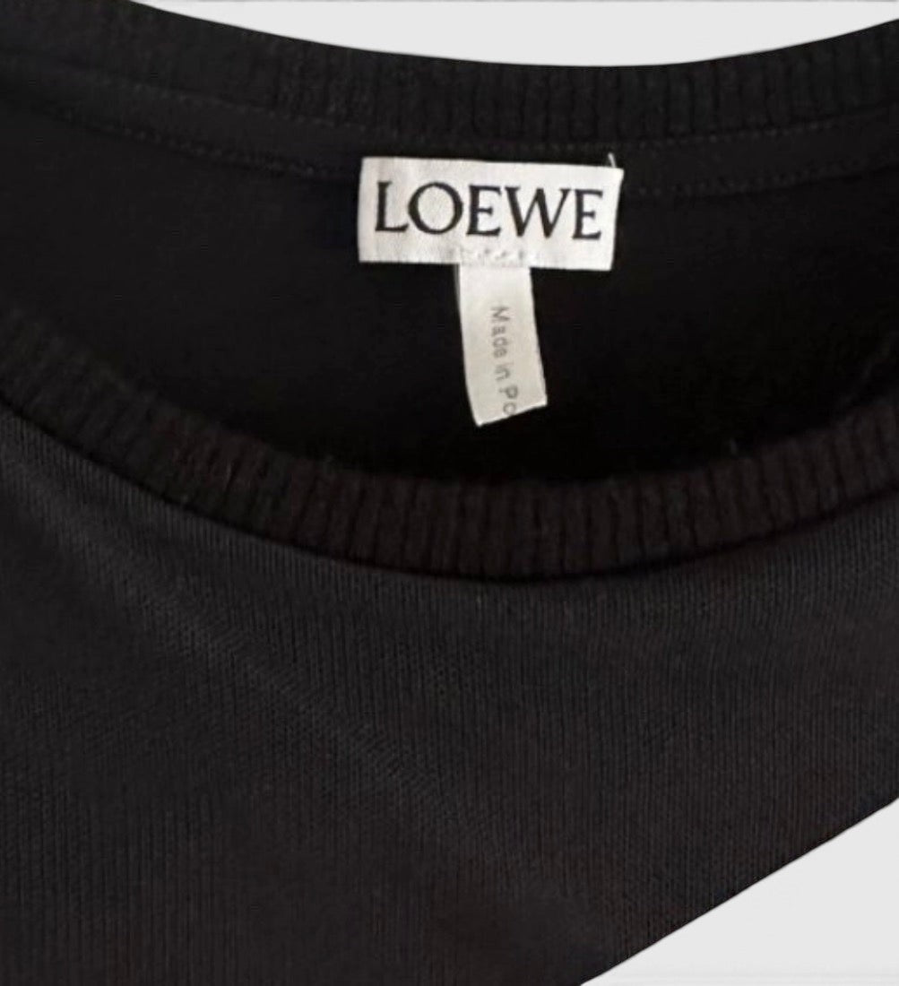 La Volta LOEWE black mesh dress featuring a white brand label at the ribbed neckline